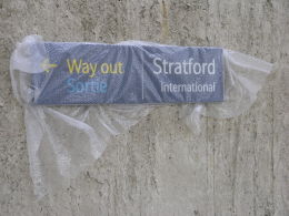 Image of Stratford station sign wrapped in protective plastic